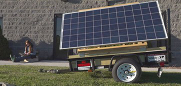 Student works on computer connected to free Wireless on Wheels wi-fi network
